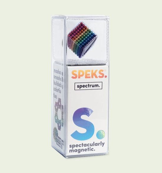Speks spectrum magnetic product packaging on a light beige background