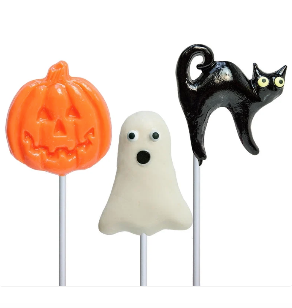 Three Halloween-themed lollipops on white sticks: an orange jack-o'-lantern, a white ghost, and a glossy black cat with yellow eyes, shown on a plain white background.