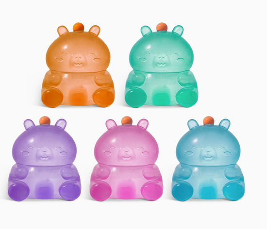 Set of five colorful bear-shaped toys on a white background