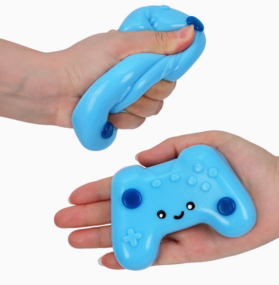 Blue stress ball with a cute face design held by hands on a white background