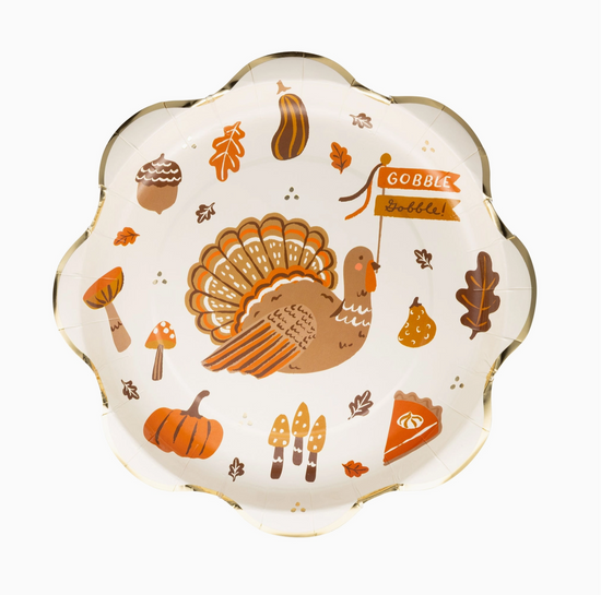 Decorative plate with Thanksgiving-themed illustrations on a white background