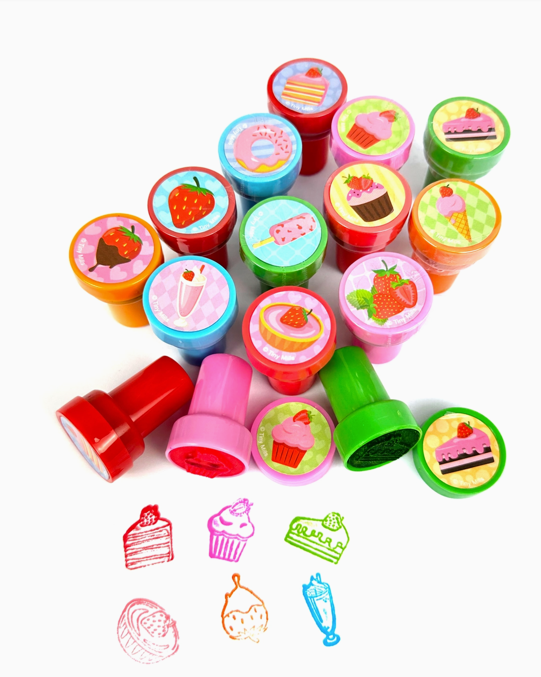 Set of colorful stampers with various designs on a white background