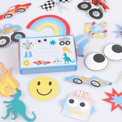 Children's craft kit with stickers, eyes, and other materials on a white background