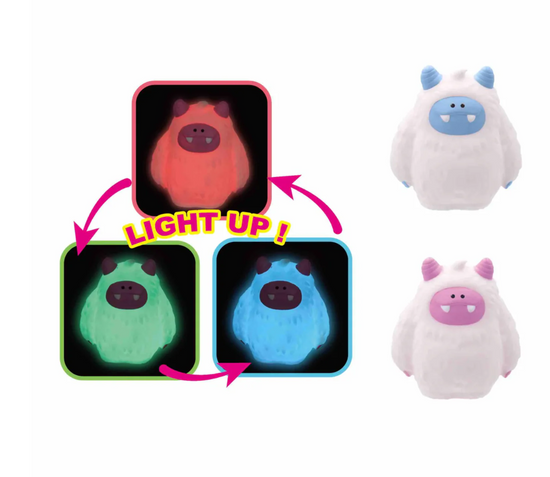 Plush toy with light-up feature on a white background