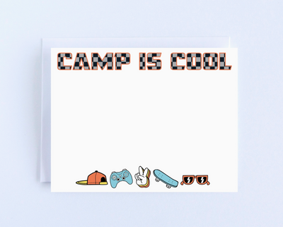 A white flat card with 'CAMP IS COOL' text and various skateboard-themed illustrations such as a skateboard, hat, and sunglasses.