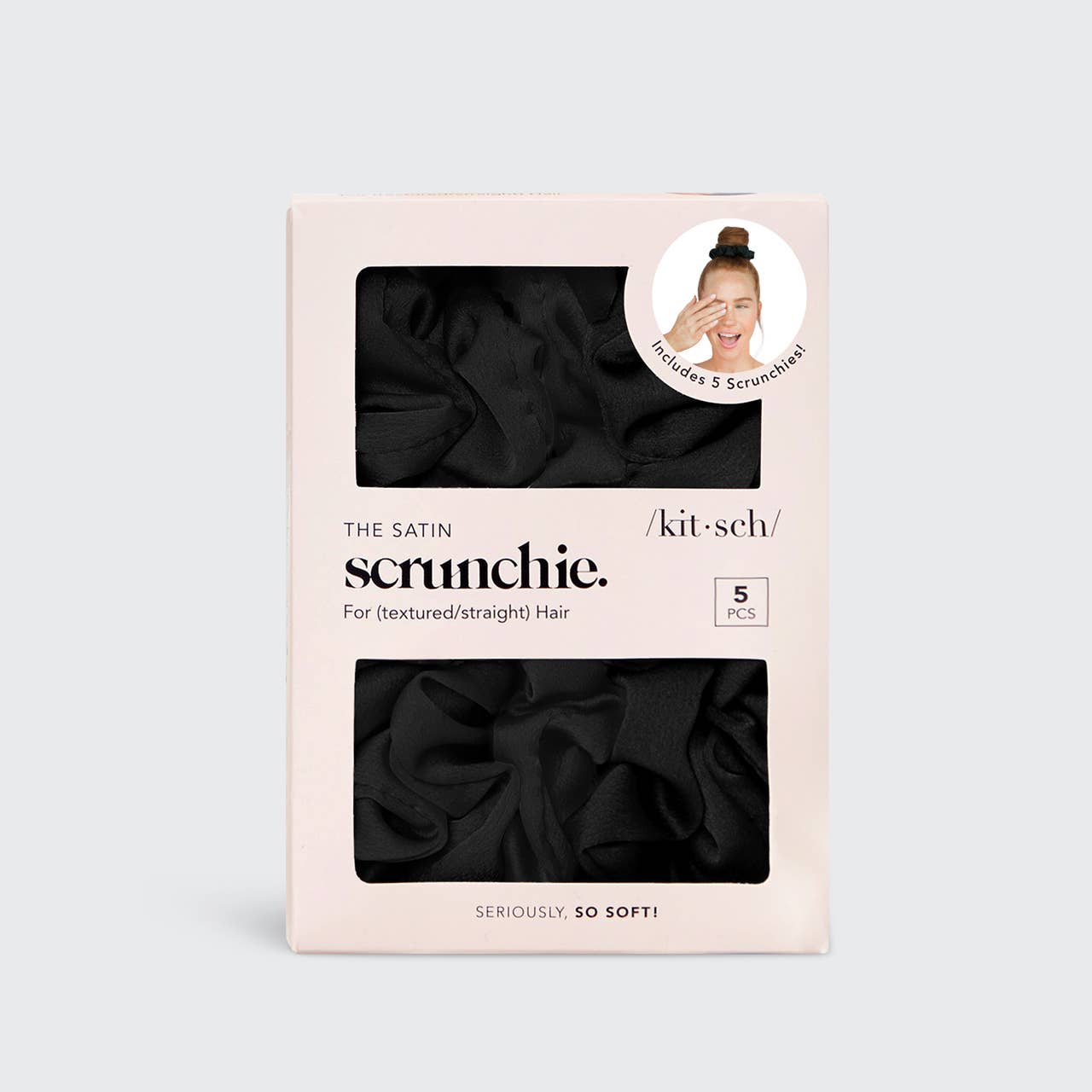 Package of black satin scrunchies with product image on a light gray background