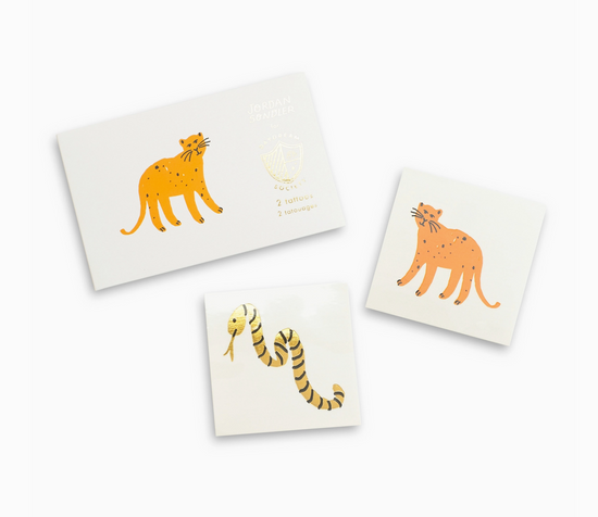 Three small cards with orange animal illustrations on a white background