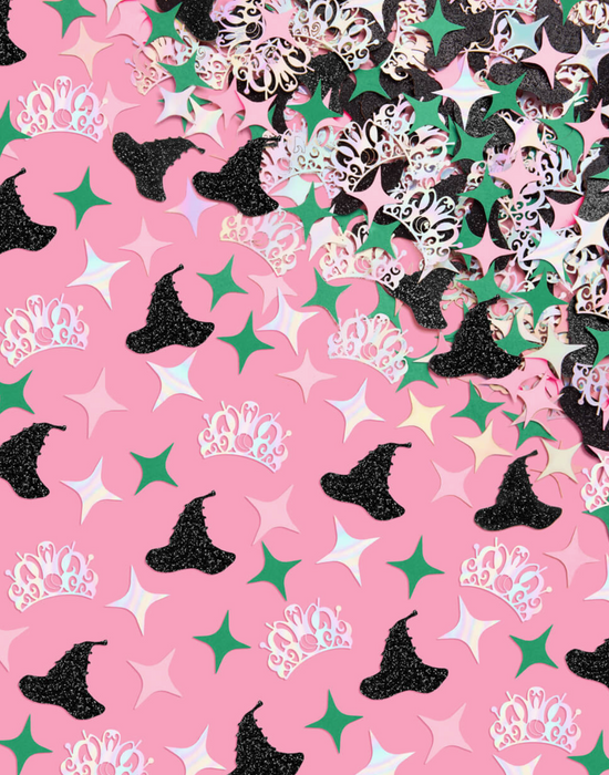 Pattern of witch hats, crowns, and stars on a pink background